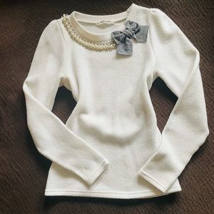 Beaded bow sweater